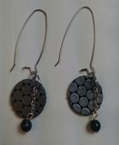 boucles d'oreilles ronds en cuir noirs 